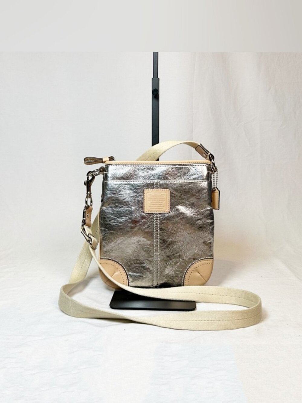 Coach Metallic Silver Vachetta Leather Swingpack East Crossbody Bag